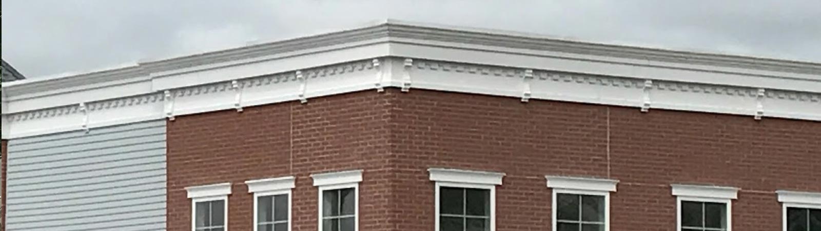 Up Close of Trim on Brick Building | PVC Pipes Norwalk | Pipe Materials Fairfield County