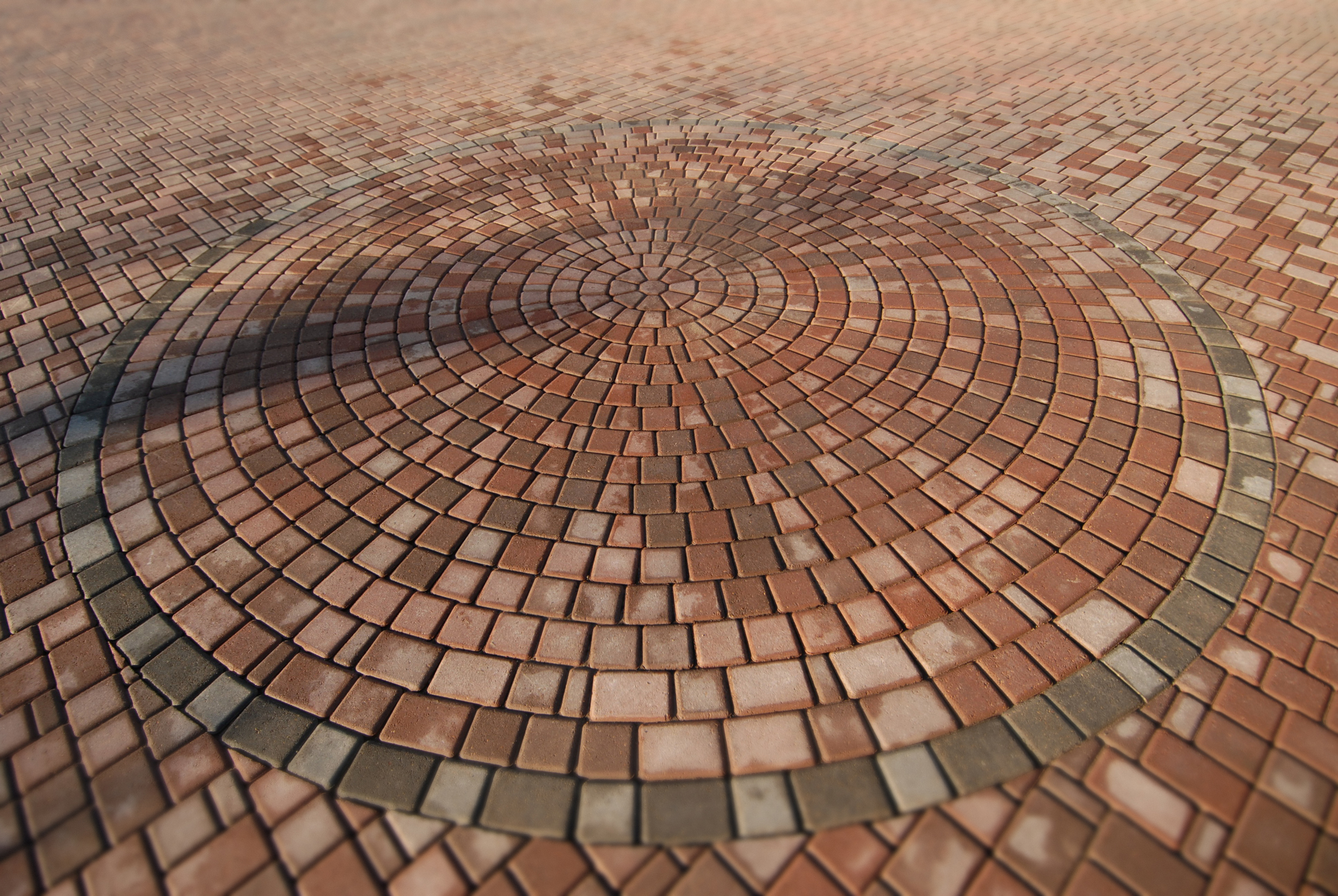 Concrete vs. Brick Pavers for Your Patio Concrete/Brick Patio